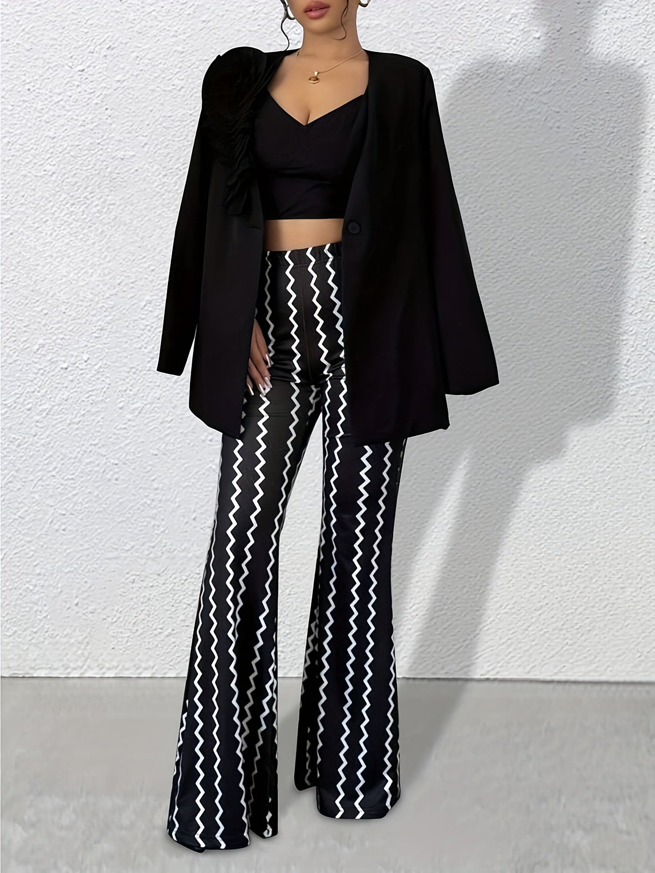 Pantalones acampanados de mujer con bloques de color y zigzag – Pantalones retro de punto que marcan tendencia