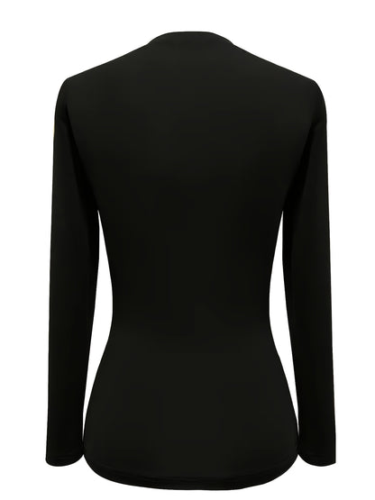 Elegante top negro de manga larga – Camiseta de cuello redondo con botones dorados